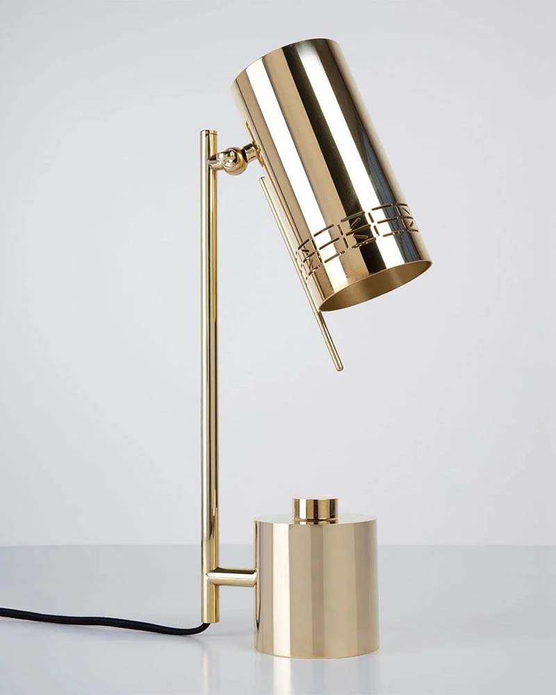 Polished brass Remains desk lamp integrated with Ketra lighting.