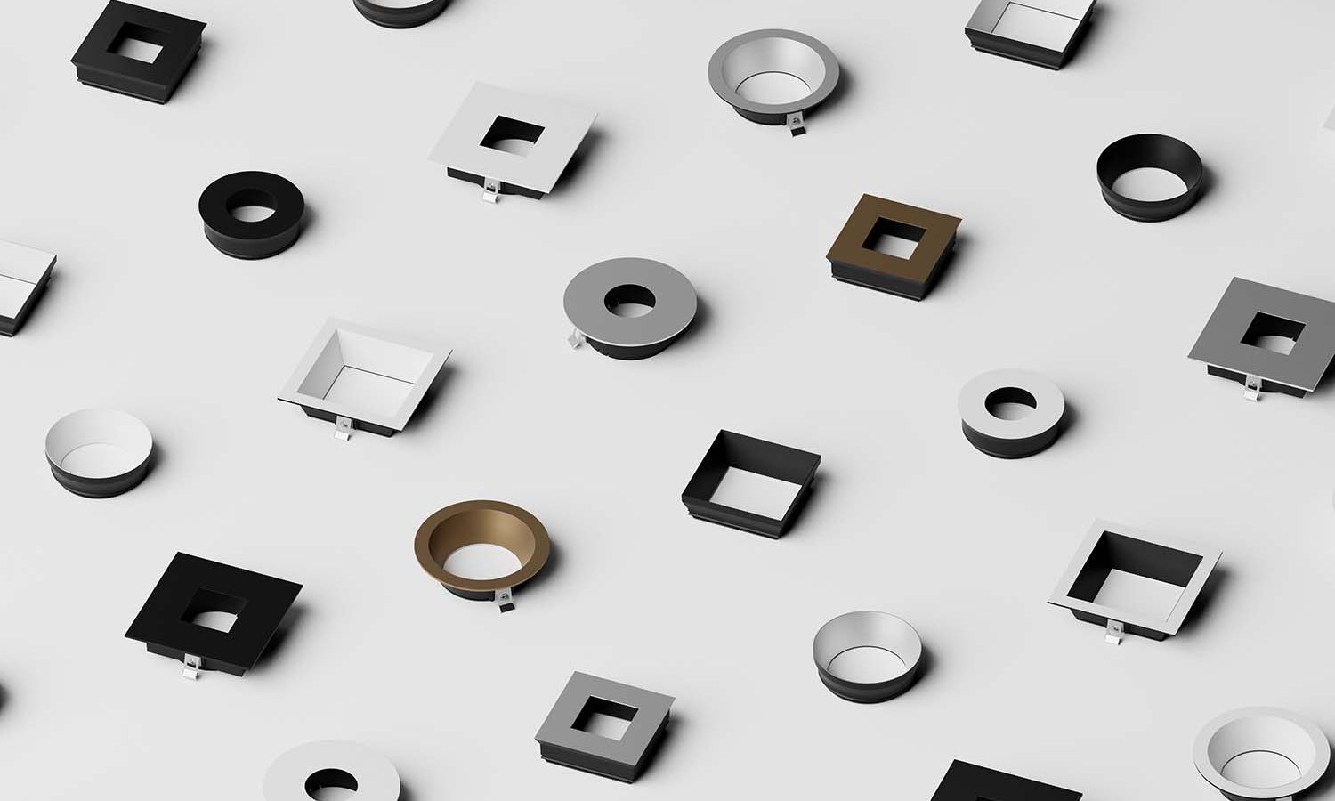 Array of Ketra downlight trims in various square, round, and color finishes.